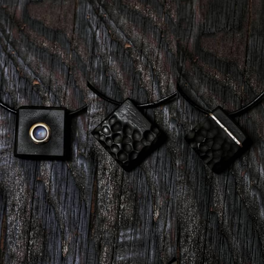 handcarved_ebony_pendants.JPG